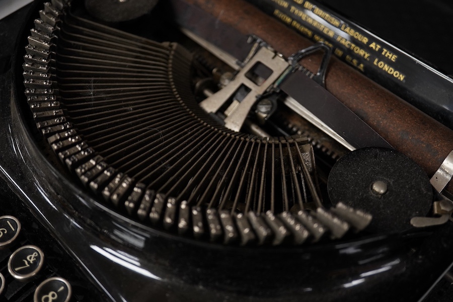 A cased Remington Home Portable typewriter. Condition - fair.